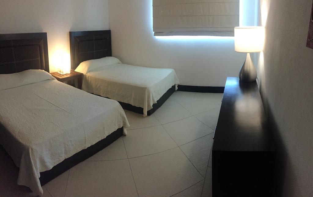 Bay View Grand Marina Condo 1004S อิกซ์ทาปา ห้อง รูปภาพ